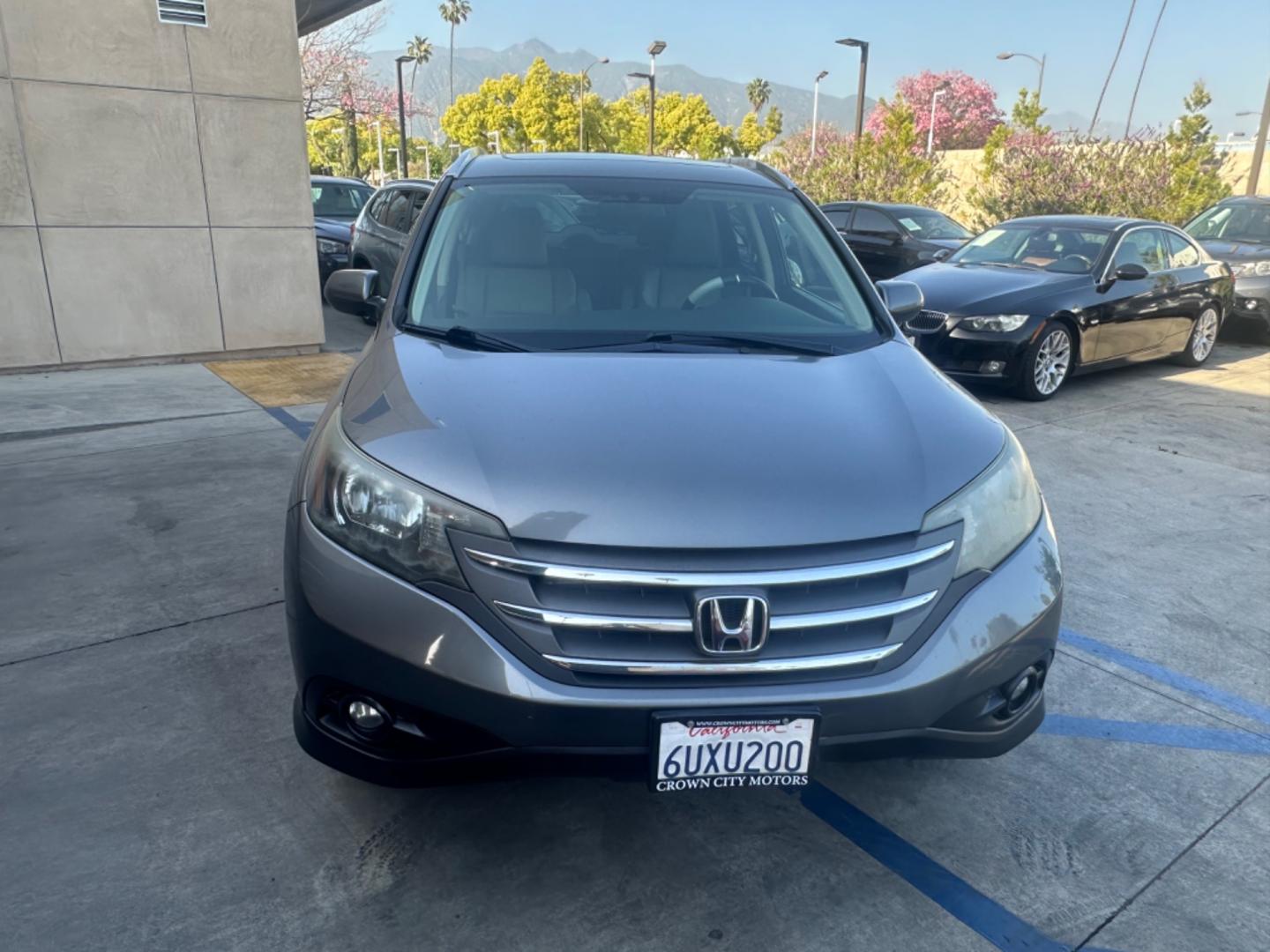 2012 Grey /Gray Honda CR-V EX-L 2WD 5-Speed AT (JHLRM3H78CC) with an 2.4L L4 DOHC 16V engine, 5-Speed Automatic transmission, located at 30 S. Berkeley Avenue, Pasadena, CA, 91107, (626) 248-7567, 34.145447, -118.109398 - Moon-roof! Leather seats! This 2012 Honda CR-V EX-L 2WD 5-Speed AT looks and drives good. - Photo#7